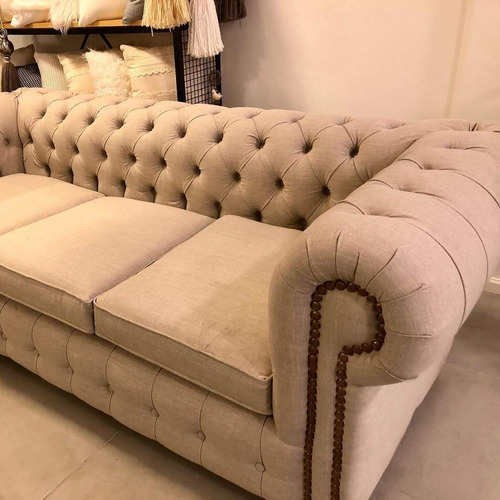 Sillón capitoné clásico